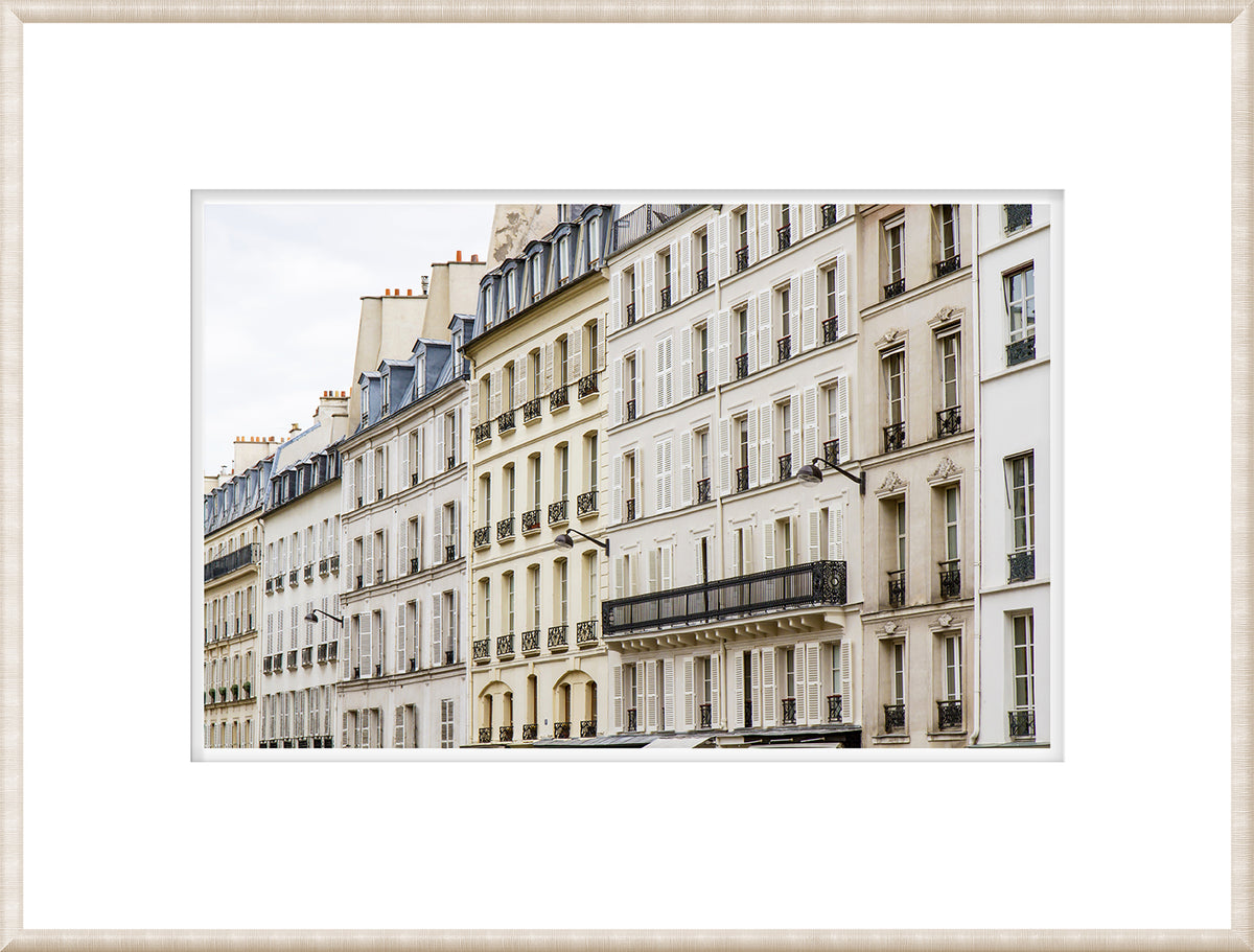 Parisian Neoclassical wall art featuring classic Parisian architecture with beige and cream buildings.