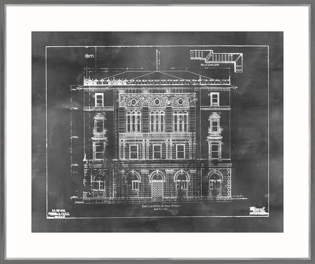 Blueprint – East Elevation wall art featuring detailed architectural drawing in white on black background.