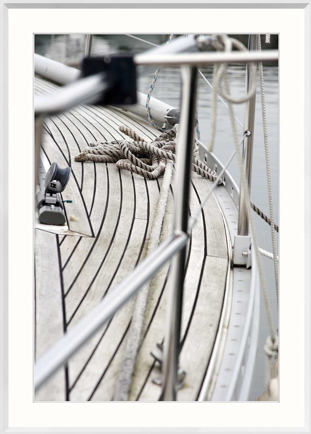 On Our Deck wall art featuring a close-up of a boat deck with coiled rope and wooden planks.