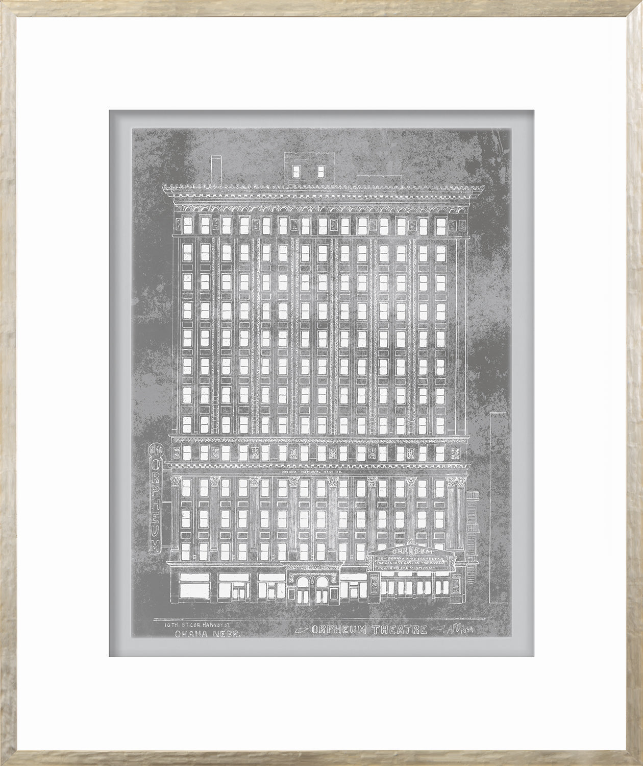 Orpheum Theatre wall art featuring a detailed silver illustration of the building.