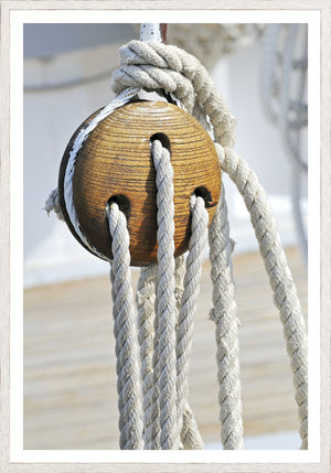 Nautical Blocks II wall art featuring a wooden pulley with ropes, showcasing a rustic maritime theme.