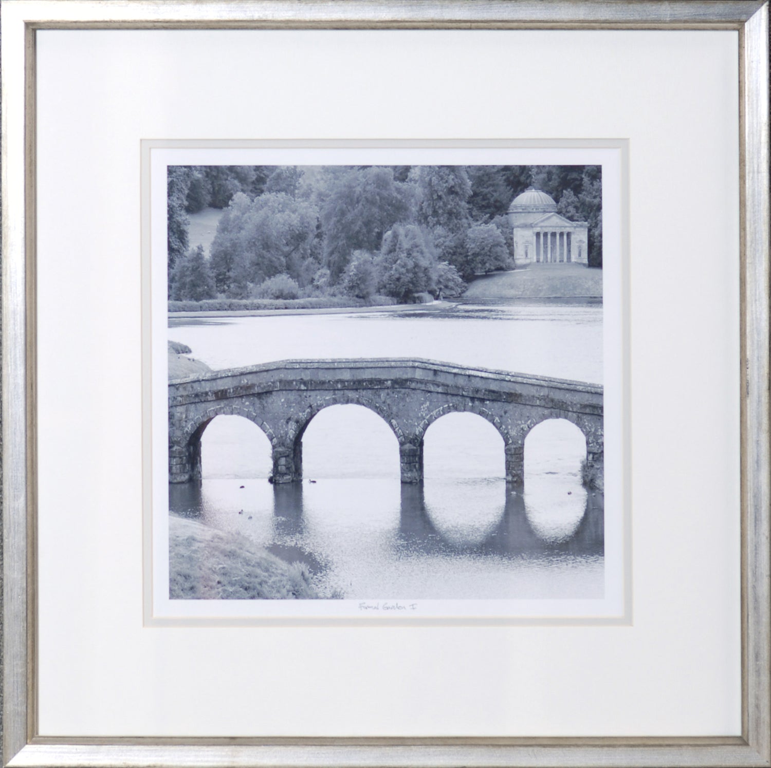 Formal Garden I wall art featuring a black and white image of a stone bridge over water.