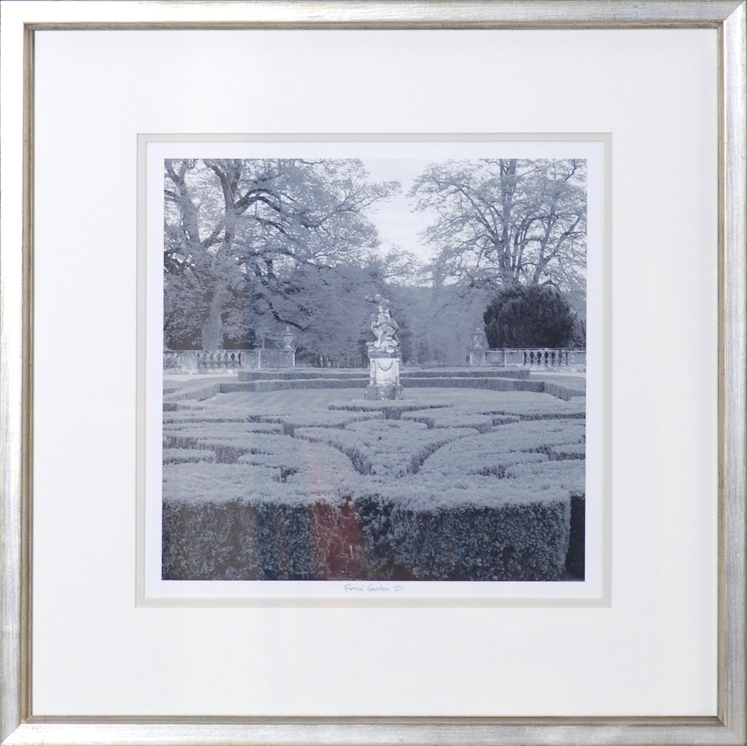 Formal Garden IV wall art featuring a monochrome garden scene with hedges and a statue.