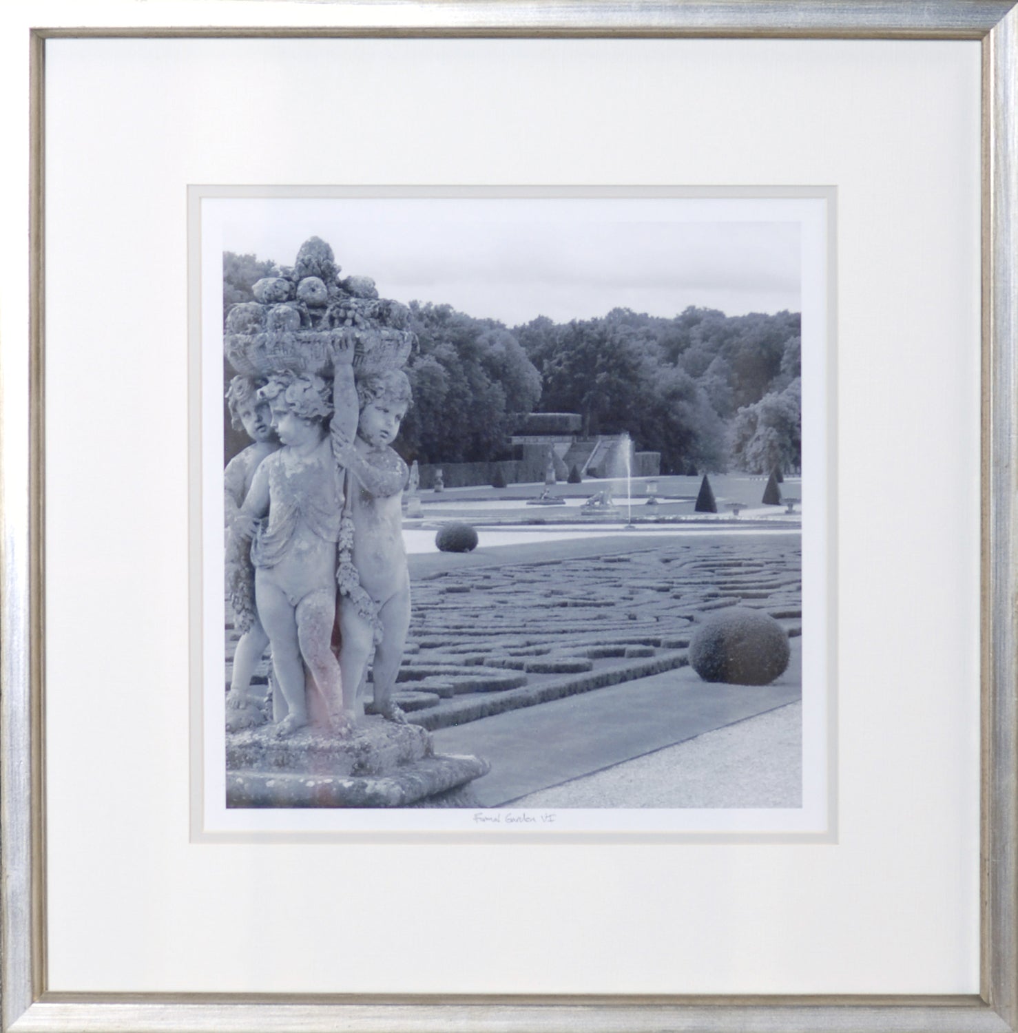 Formal Garden VI wall art featuring a black and white image of cherubs and a garden landscape.