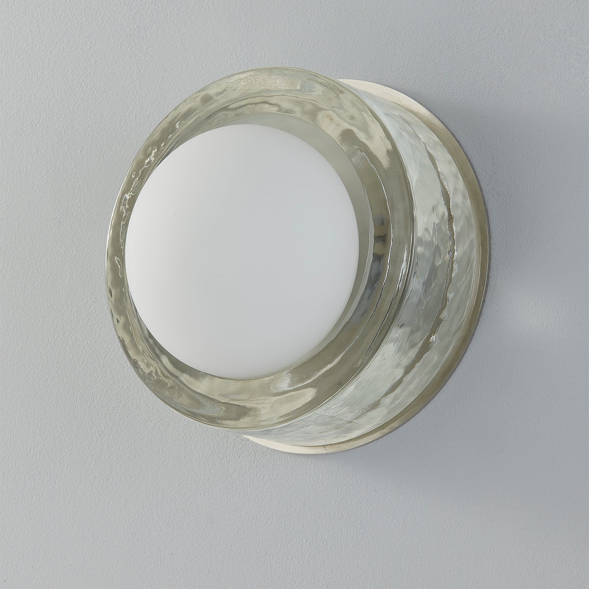 Close-up of the Mackay Wall Sconce 7.75" x 0" in polished nickel showing the arm curve and shade silhouette.