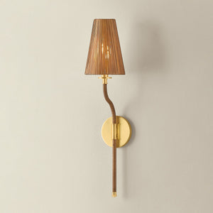 Atwood Wall Sconce in aged brass shown from the front to reveal the arm curve and shade silhouette.