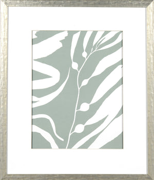 Seagrass II wall art featuring a light green background with white leaf patterns, framed in silver.