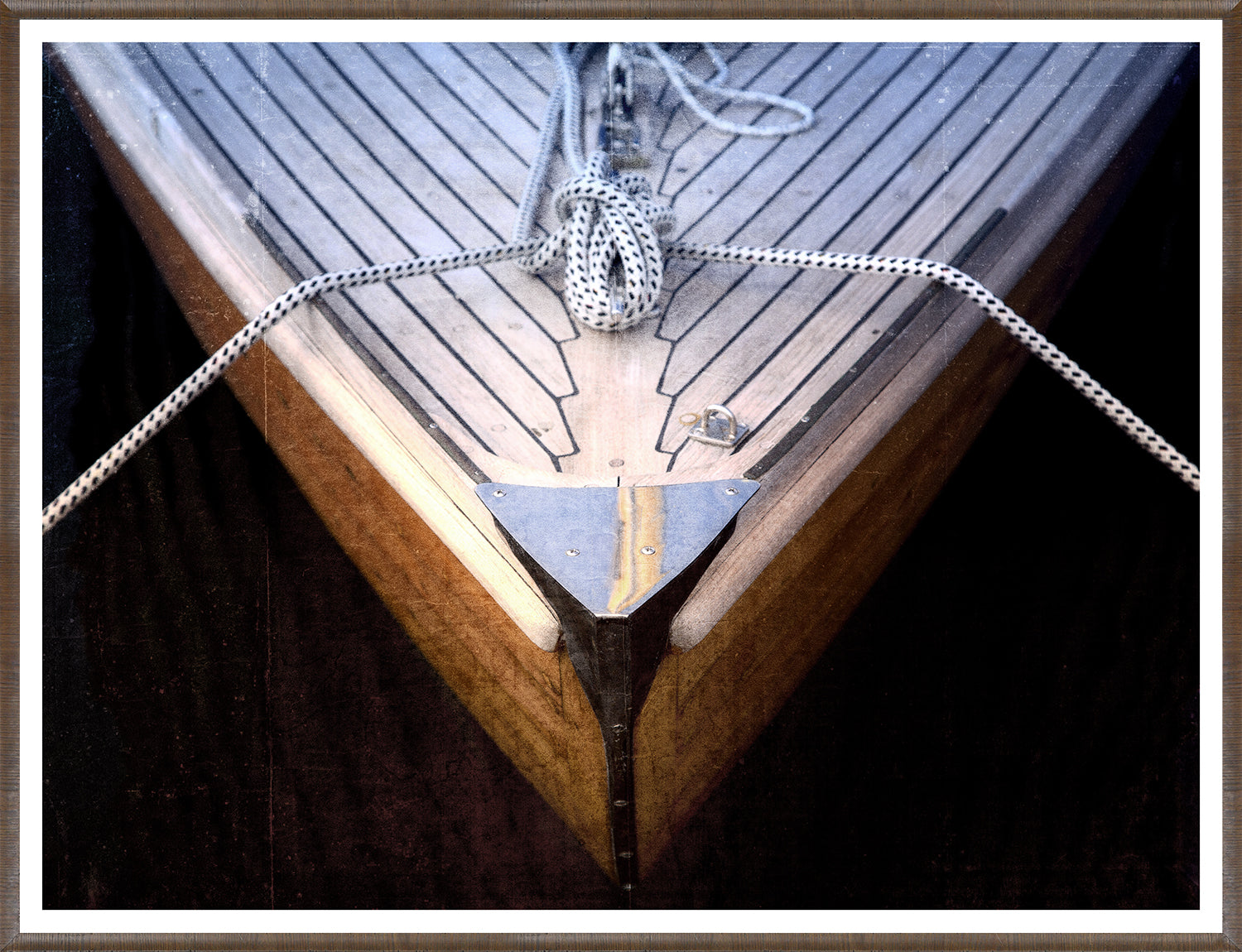 Bow Cleat wall art featuring a wooden boat's bow with rope and cleat detail.