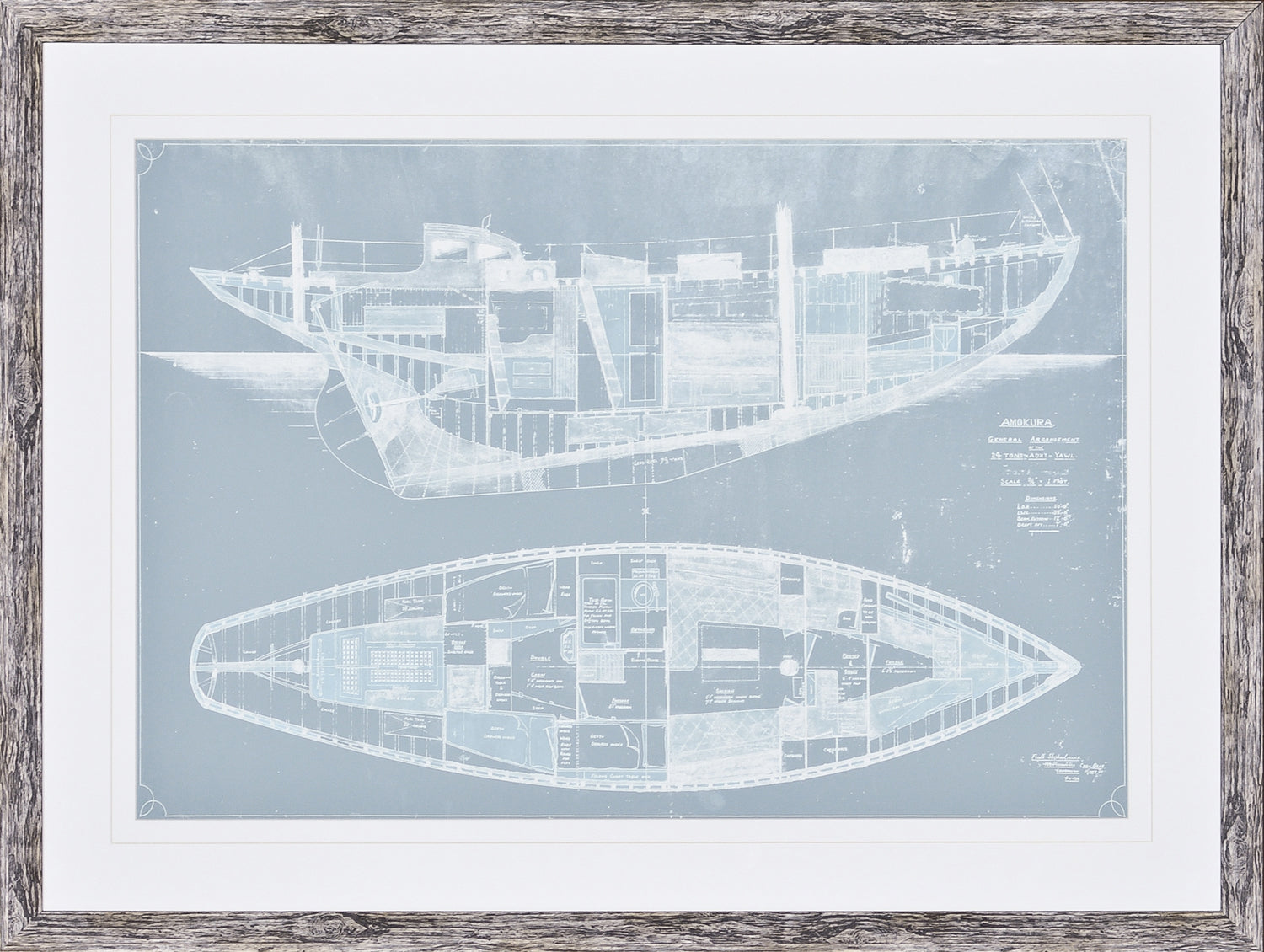 Amokura wall art featuring a blueprint of a boat in blue and white, framed in a rustic wood frame.