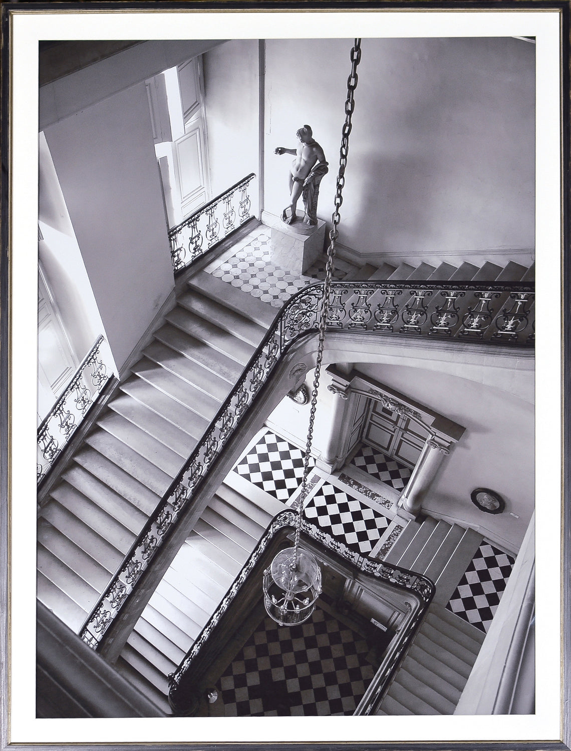 Versailles Marble Staircase wall art featuring a black and white view of a grand staircase