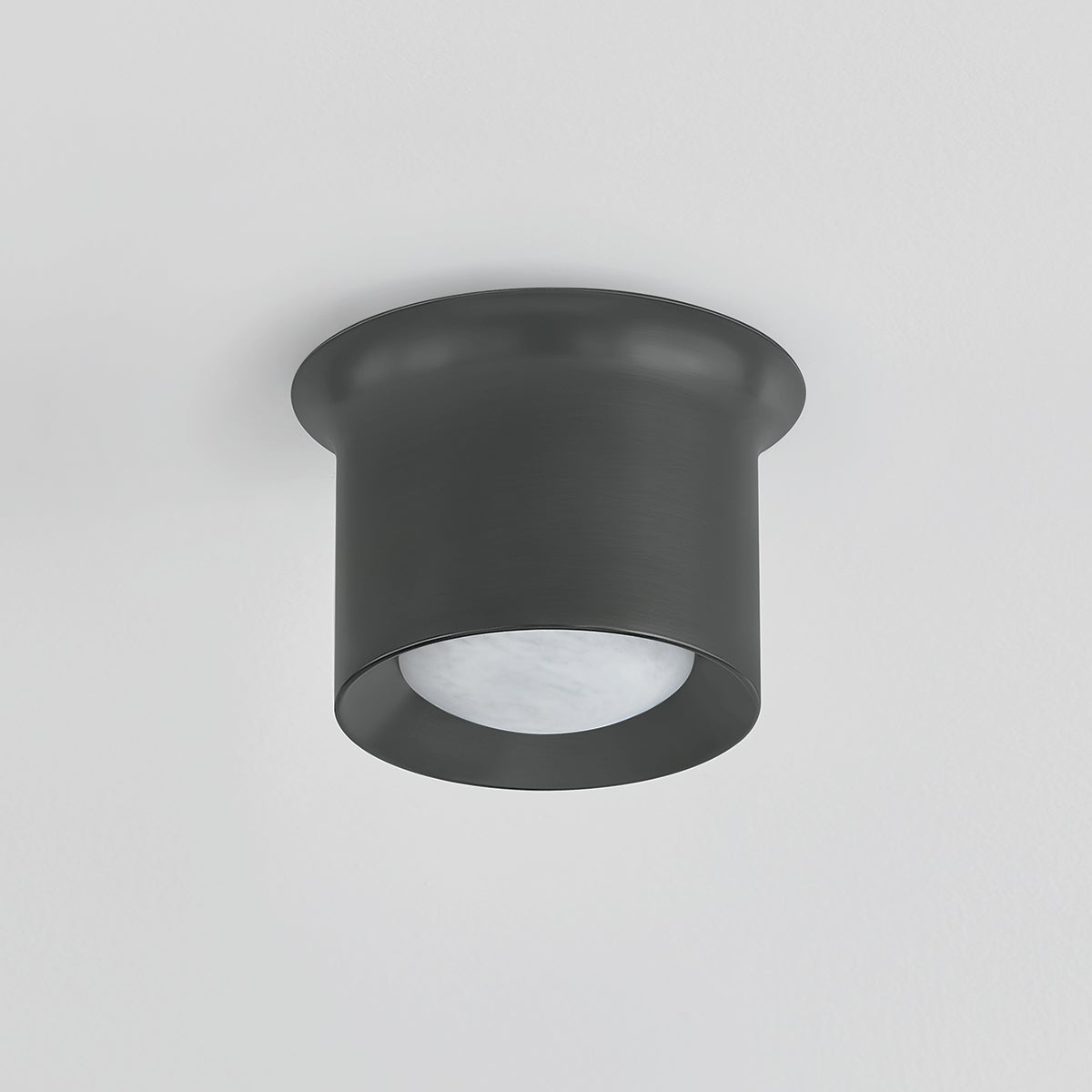 Close-up of the Noxon Flush Mount 7" in dark bronze showing the shade profile and mounting canopy.