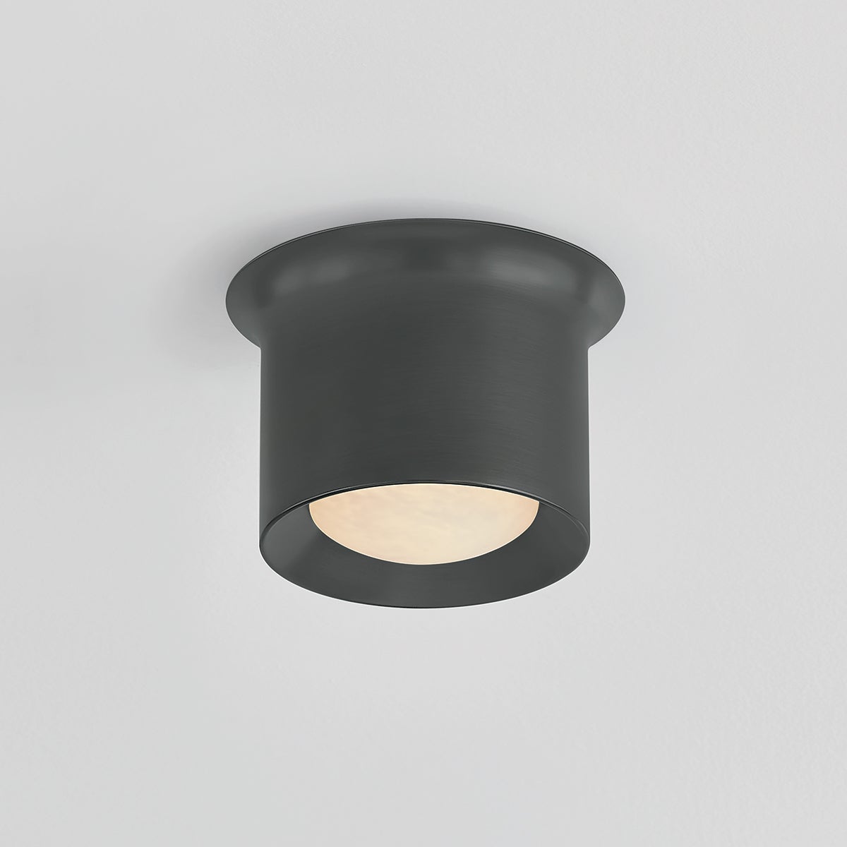 Close-up of the Noxon Flush Mount 7" in dark bronze showing the shade profile and mounting canopy.