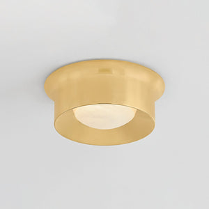Close-up of the Noxon Flush Mount 13.75" in aged brass showing the shade profile and mounting canopy.