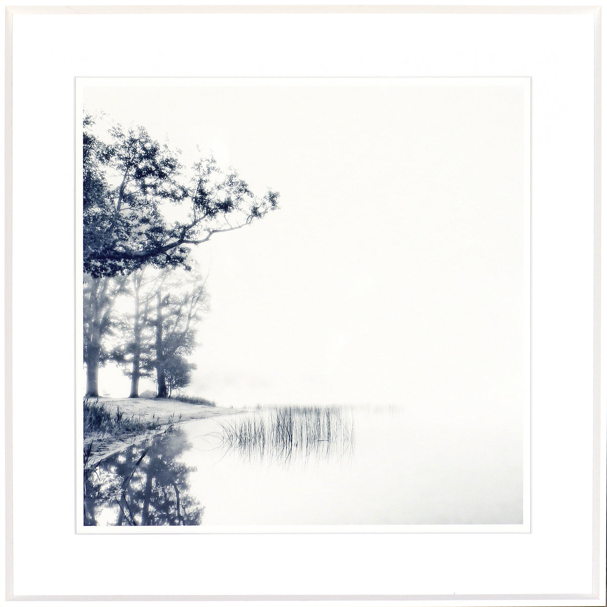 Indigo Landscape Series III wall art featuring a serene lake scene with trees and fog in blue tones.