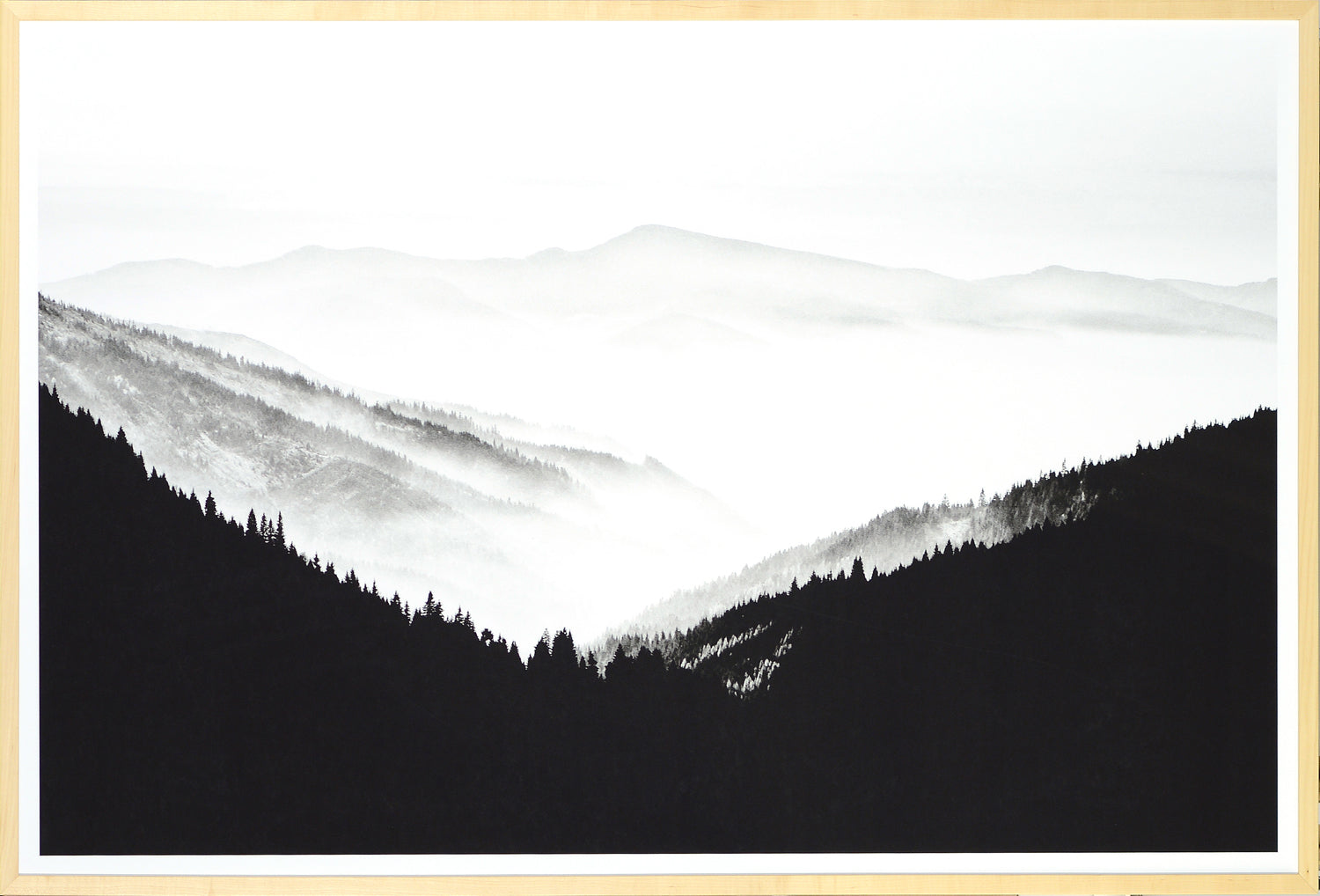 Northern Ridge wall art featuring a black and white mountain landscape with misty valleys