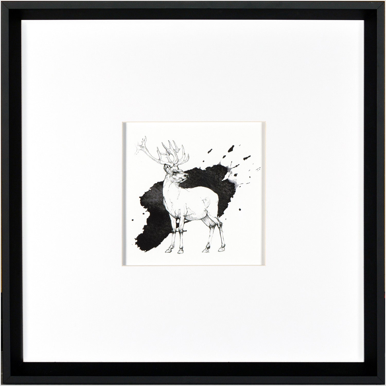 Stag Doodle wall art featuring a black and white deer illustration with ink splashes.