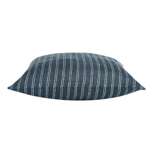 Oakley pillow featuring a dark blue fabric with white vertical stripes, showcasing a soft, rounded design.