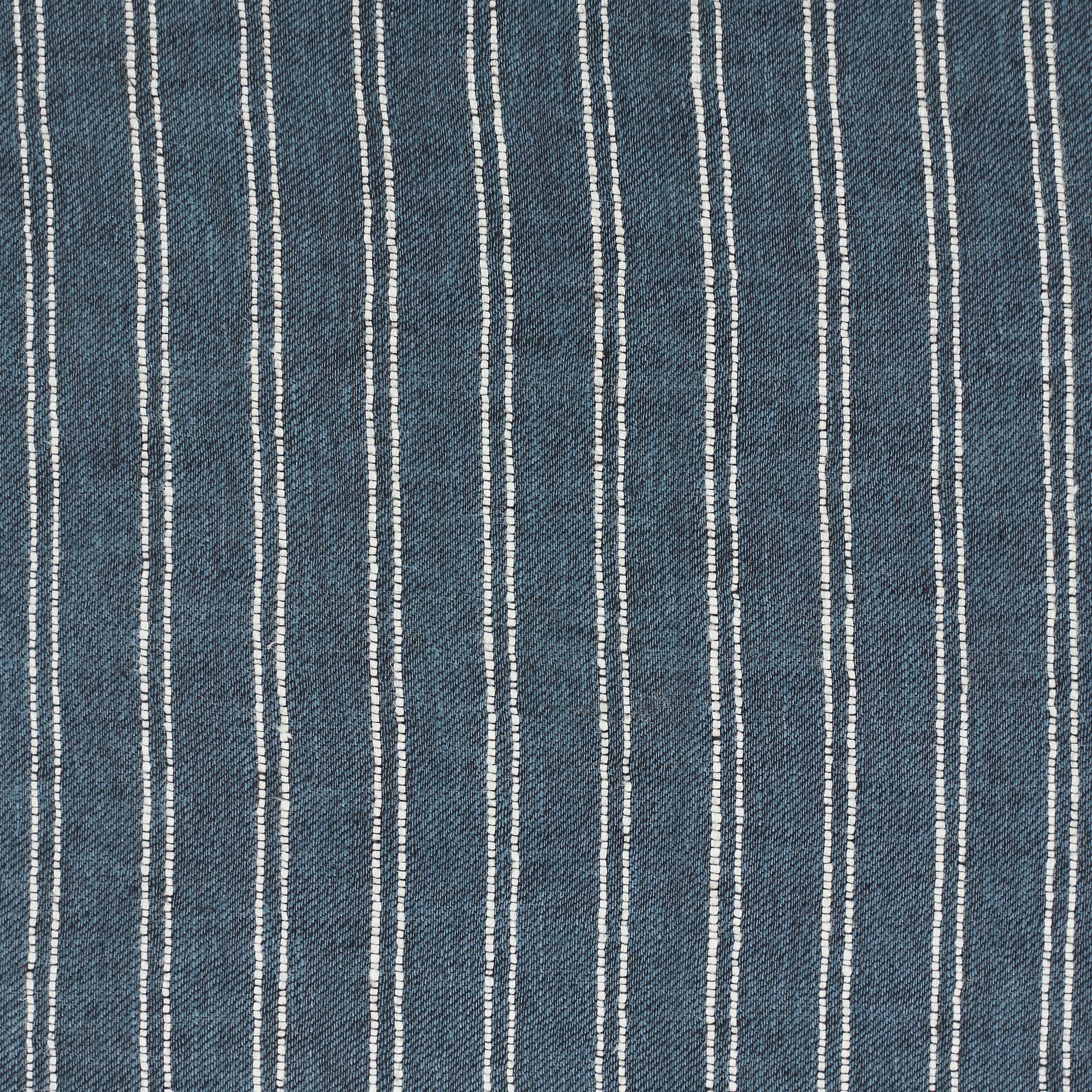 Oakley pillow featuring a textured blue fabric with white vertical stripes, showcasing a modern and stylish design.