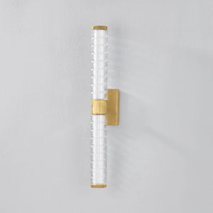 Castor Bath Sconce 4.25" x 24.25" in aged brass shown from a second angle to highlight the arm spread and shade silhouette.