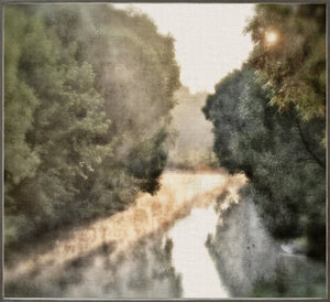 Early Morning Mist wall art featuring a serene river scene with mist and lush greenery.