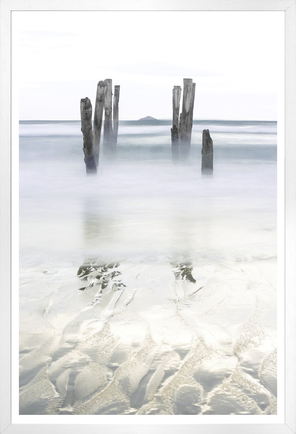 Breakwater wall art featuring weathered wooden posts in calm water, soft gray and white tones.