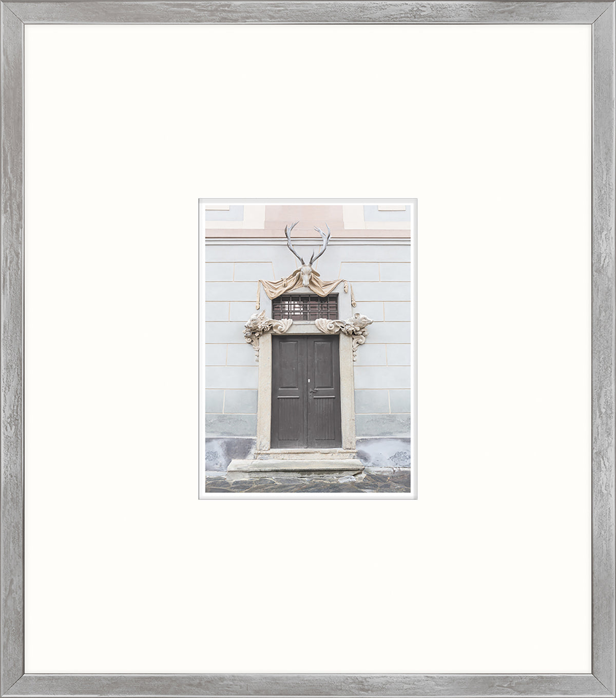 Pastel Revival Series XVI wall art featuring a decorative door with antlers and intricate stonework.