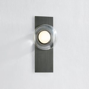 Close-up of the Pound Ridge Wall Sconce in dark bronze showing the arm curve and shade silhouette.