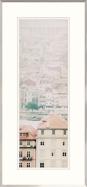 Porto II wall art featuring a soft, muted cityscape with pastel buildings and red rooftops