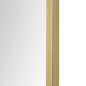 Detail view of Durness mirror's side, highlighting the brushed gold frame and smooth finish.