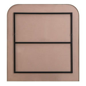 Back view of Joan mirror showing a pink backing and black mounting brackets.