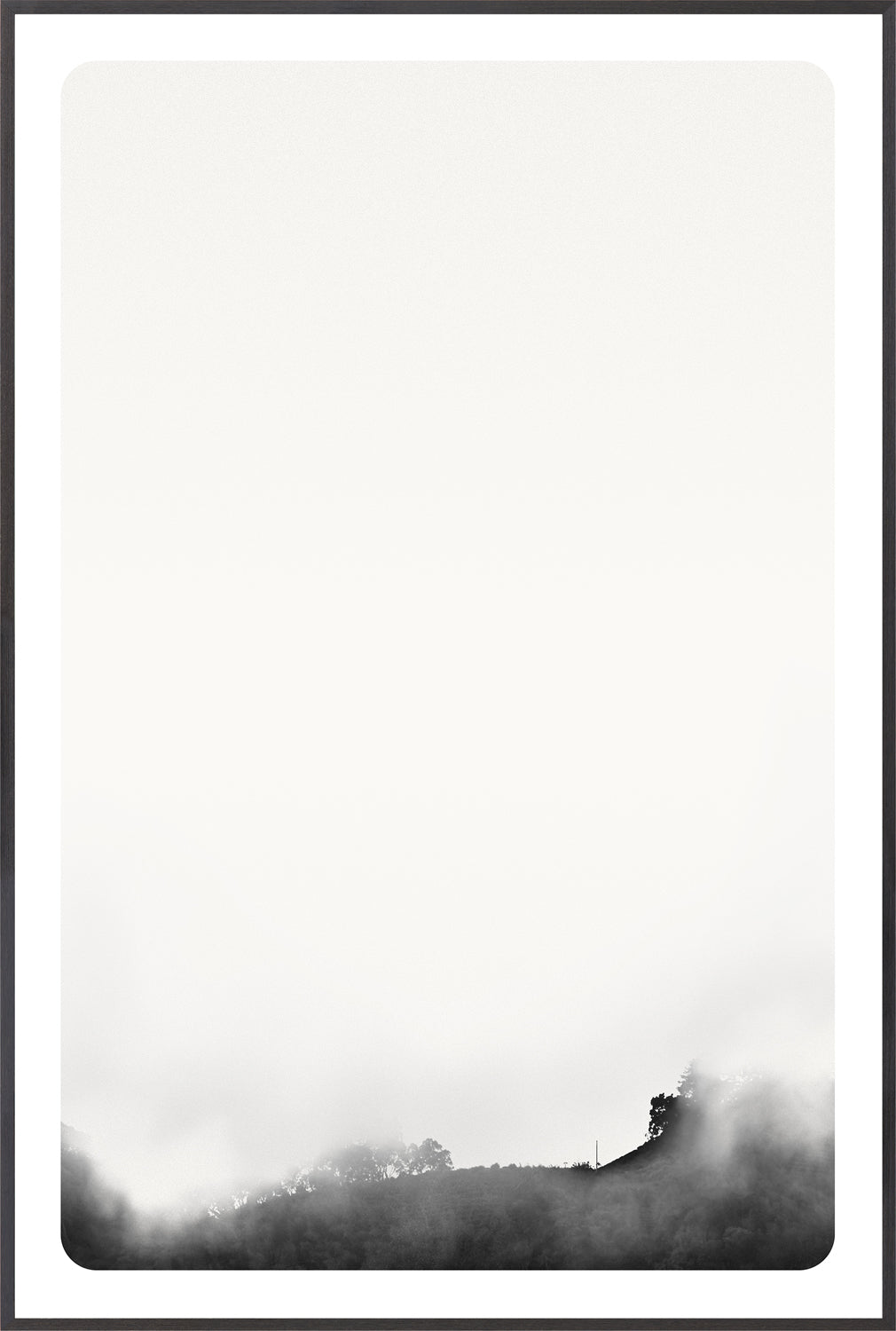 Genesis III wall art featuring a minimalist black and white foggy landscape.