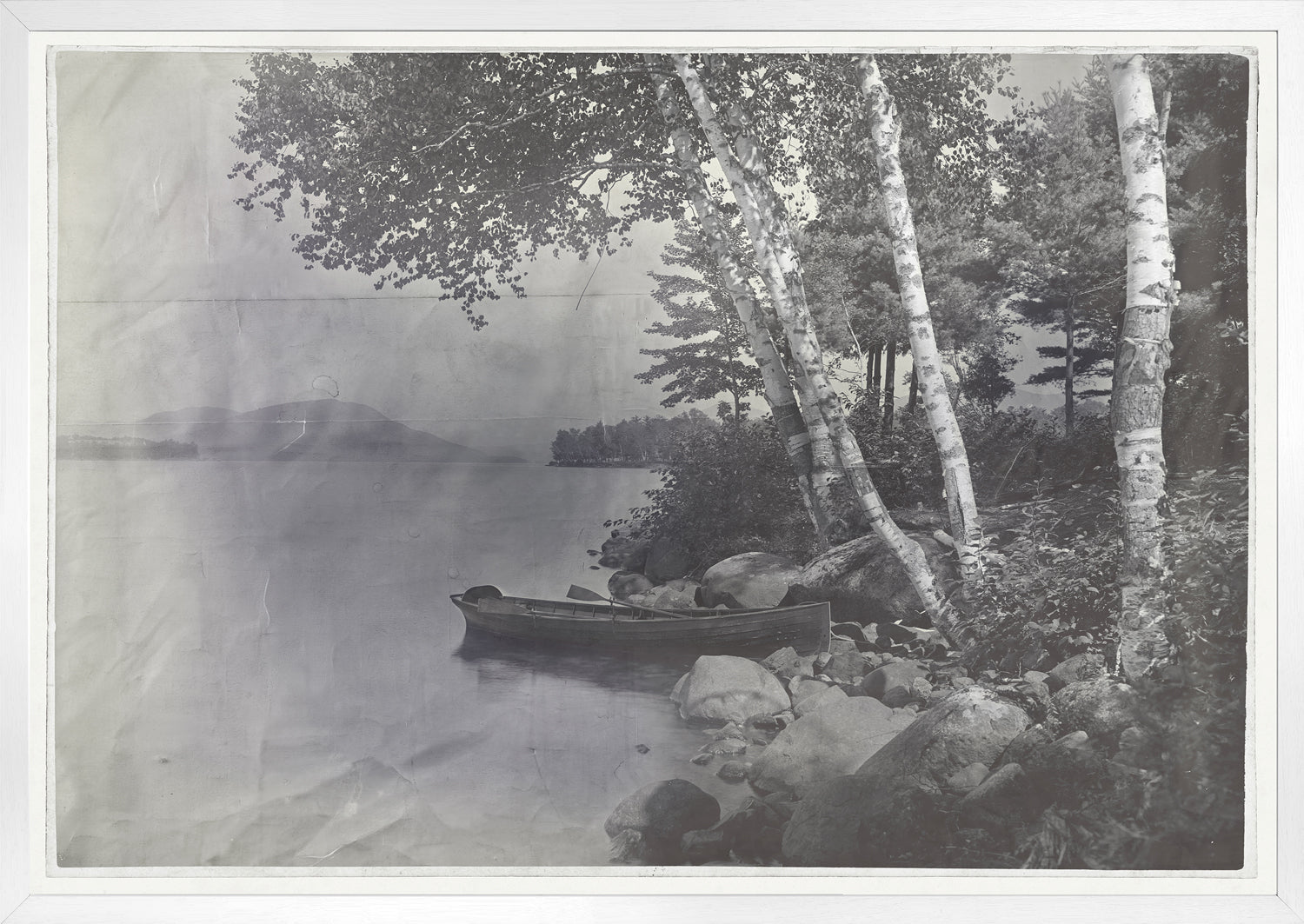 Indigo Stained – Lake George wall art featuring a serene lake view with a boat and trees.