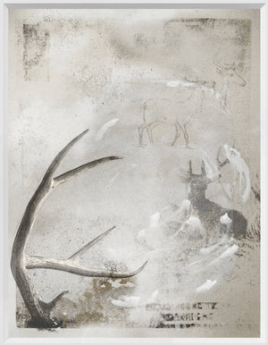 Wilderness Plate I wall art featuring a soft gray background with antlers and deer silhouettes.