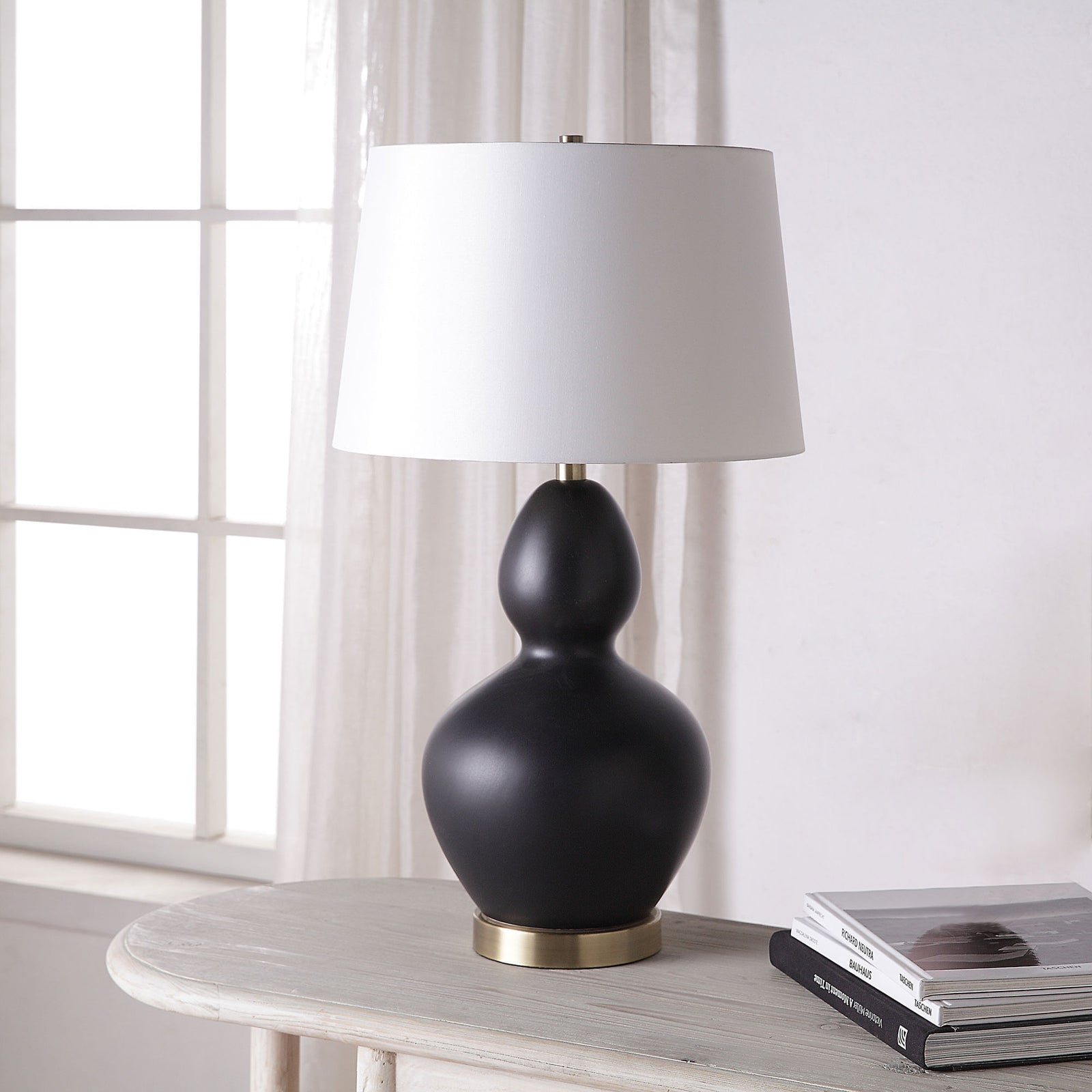 Kamilia — a Renwil table lamp for living rooms, entries, and bedrooms at Laurie Yapp Home.
