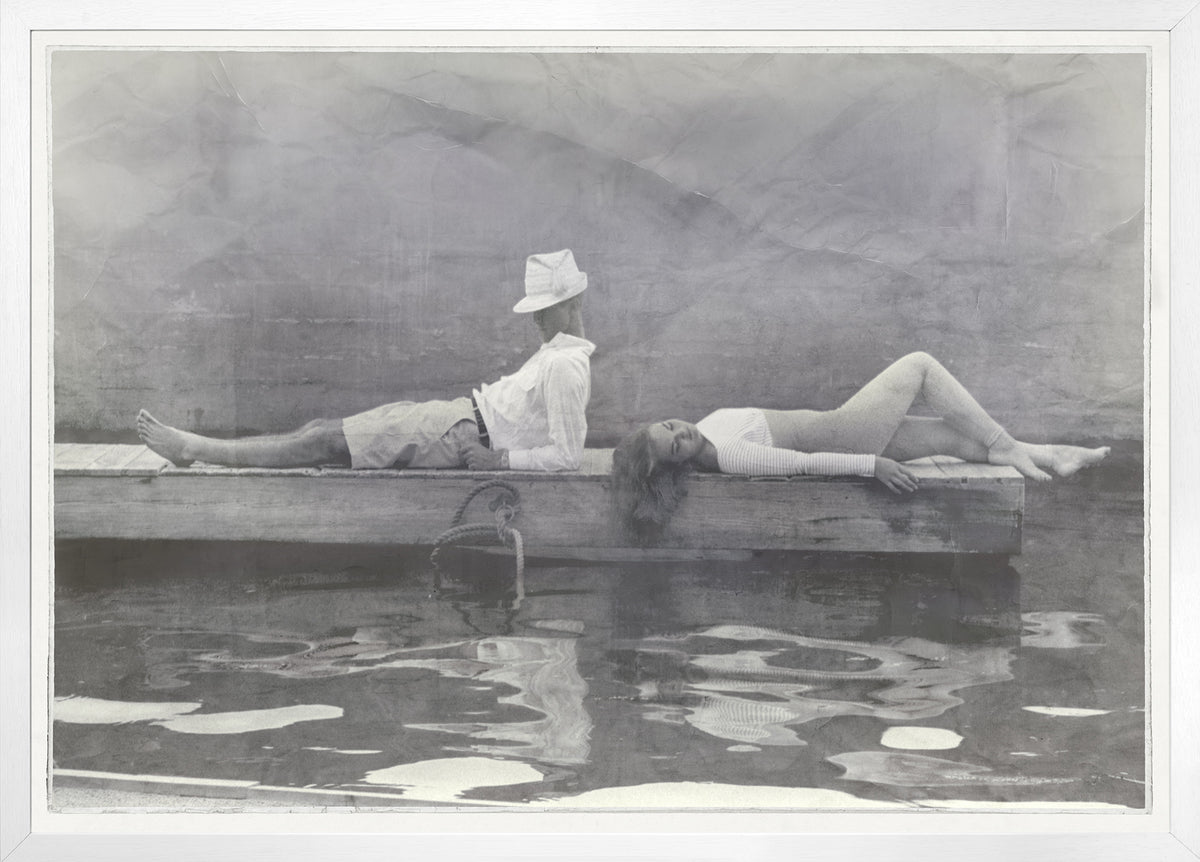 Indigo Stained – Leisure Time wall art featuring a black and white photo of a man and woman on a dock.