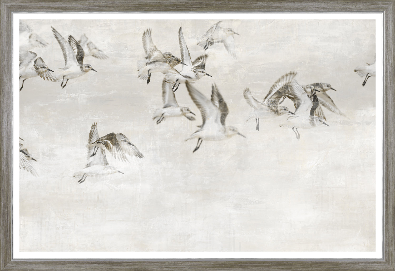Sandpipers Take Wing wall art featuring flying sandpipers in muted tones on a textured background.