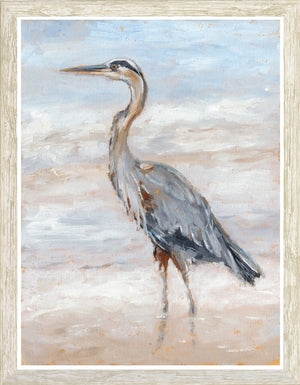 Beach Heron II wall art featuring a heron in soft blue and beige tones, framed in a light wood frame.