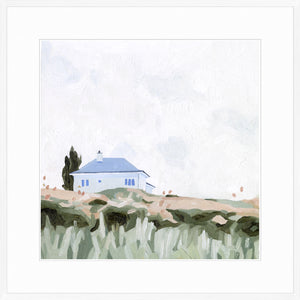 House on a Hill II wall art featuring a blue house on a grassy hill under a cloudy sky