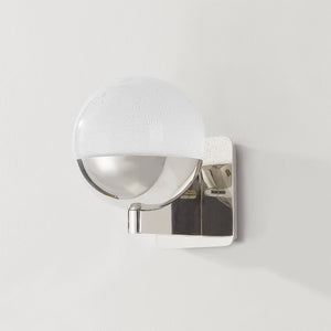 Close-up of the Rochford Wall Sconce in polished nickel showing the arm curve and shade silhouette.