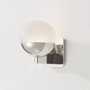 Close-up of the Rochford Wall Sconce in polished nickel showing the arm curve and shade silhouette.
