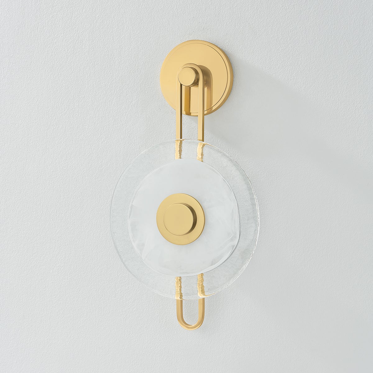Keuka Park Wall Sconce in aged brass shown from the front to reveal the arm curve and shade silhouette.