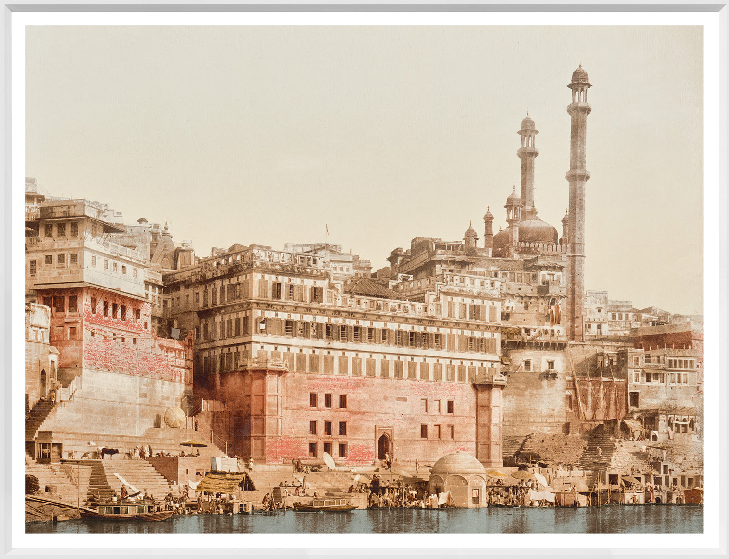 Benares, India 19th C, featuring historic buildings along the riverbank, with intricate architecture and minarets.