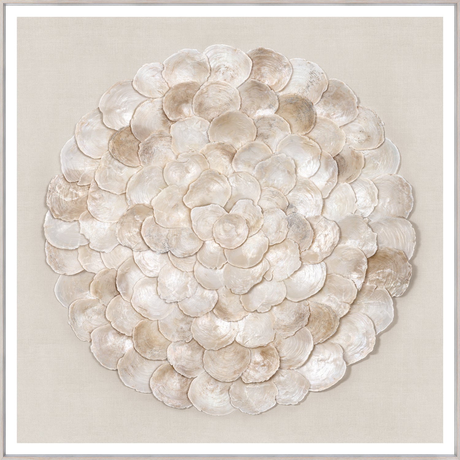 Capiz Medallion wall art featuring layered shell design in neutral tones on a beige background