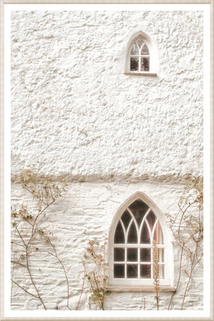Masonry – Arched Windows wall art featuring two arched windows on a textured white wall.