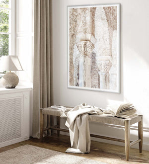 Masonry wall art displayed in a bright room with a wooden bench and decor.