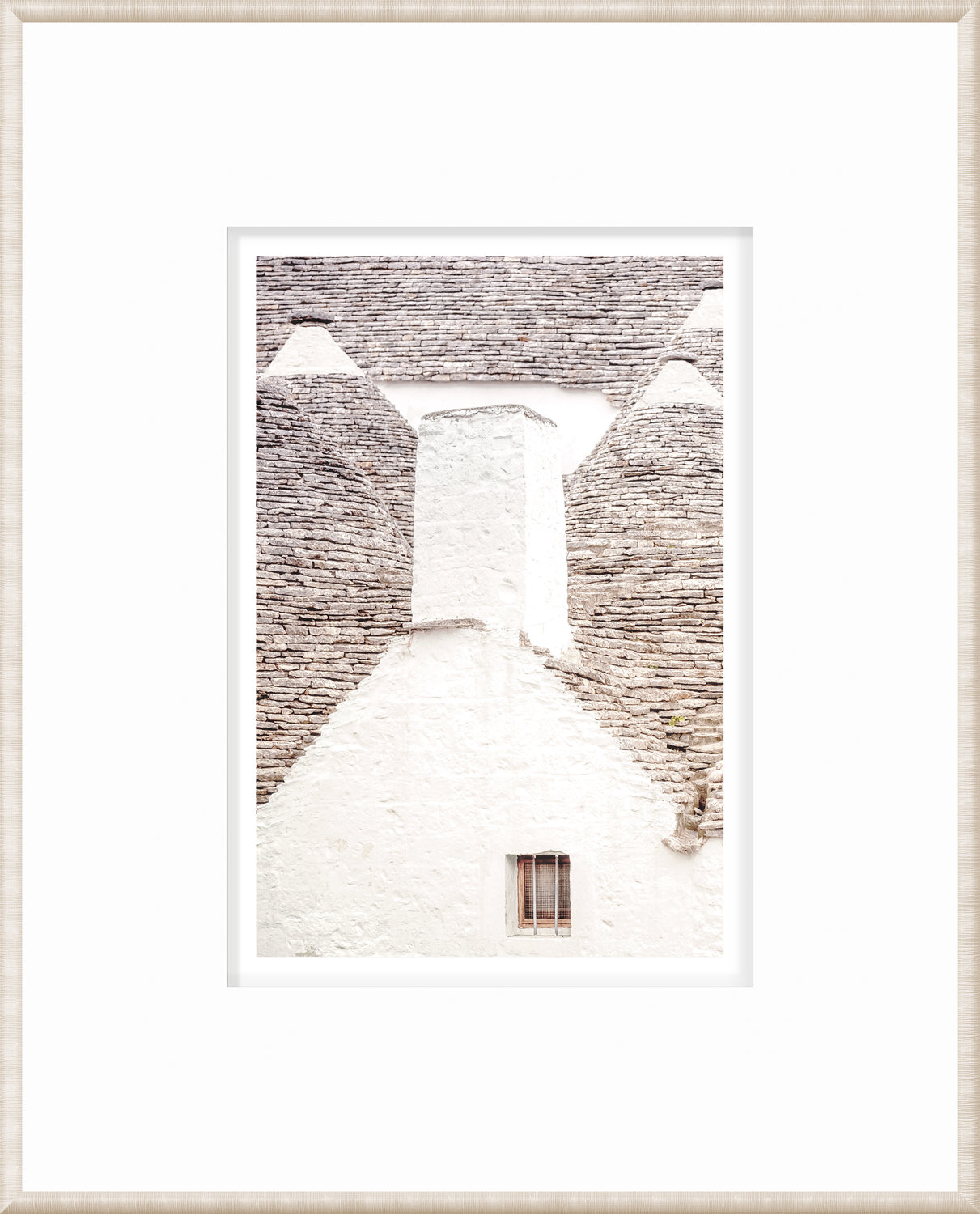 Masonry – Trullo Rooftops wall art featuring white stone structure with gray stone rooftops.