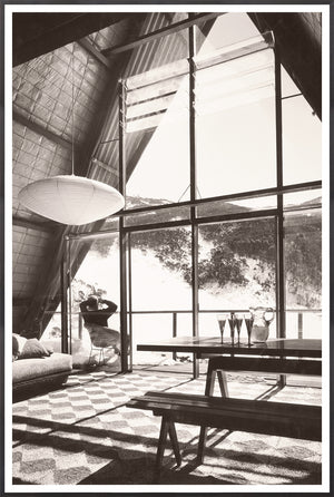 Ski Lodge Interior C. 1966 wall art featuring a cozy cabin with large windows and a mountain view.