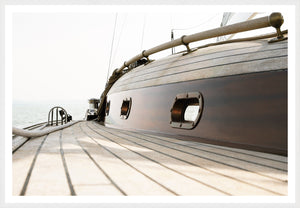 Sailing Details II wall art featuring a close-up view of a wooden sailboat deck with polished wood and metal details.