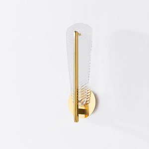 Passaic Wall Sconce in aged brass shown from the front to reveal the arm curve and shade silhouette.