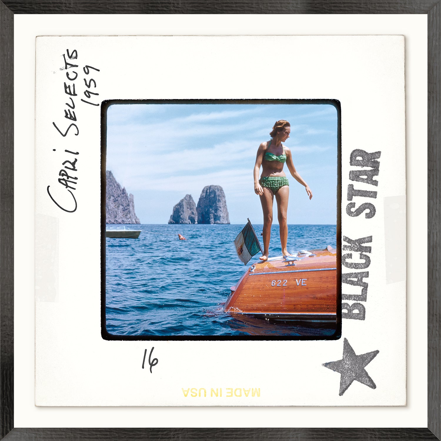 Toni Frissell Slides – Capri Selects I C. 1959, a woman in a green bikini on a boat by the sea